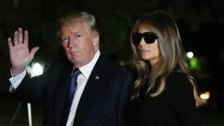 Donald Trump and Melania Trump return to the White House at night in Washington, DC (2017)