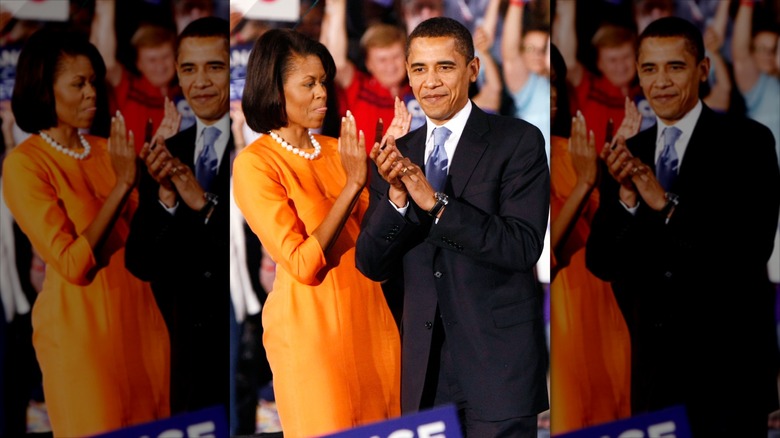 Michelle and Barack Obama clapping