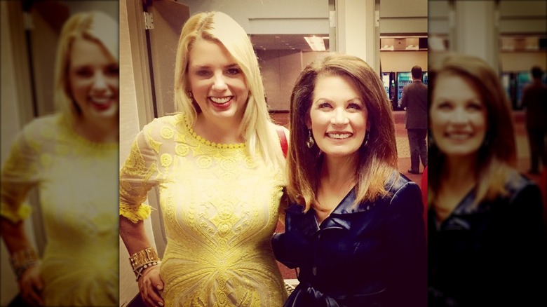 Pam Bondi in a heavily edited photo with woman in blue.