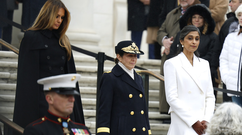 Melania Trump and Usha Vance attend a wreath-laying ceremony at Arlington National Cemetery on January 19, 2025 in Arlington, Virginia.