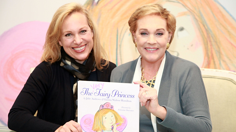 Julie Andrews and Emma Walton Hamilton posing with one of their books