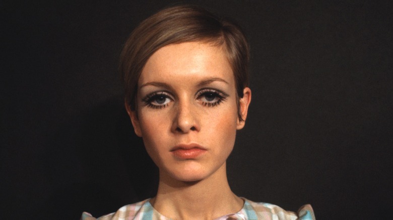Supermodel Twiggy posing with short blonde hair