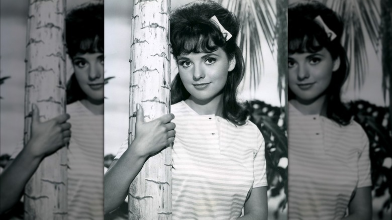 Dawn Wells poses in a striped shirt