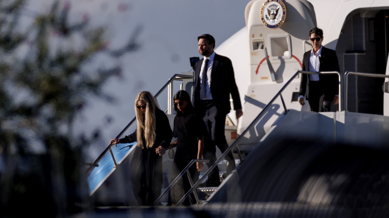 Erika Kirk exiting Air Force Two with Usha Vance and JD Vance