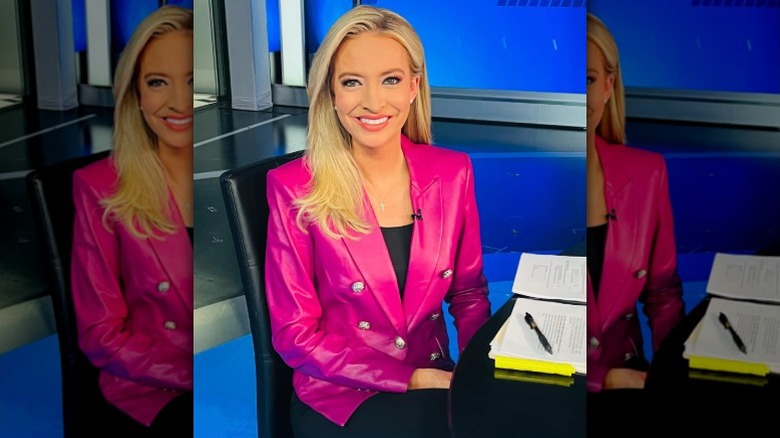 Kayleigh McEnany at her Fox News desk in a bright pink pleather blazer (2024)