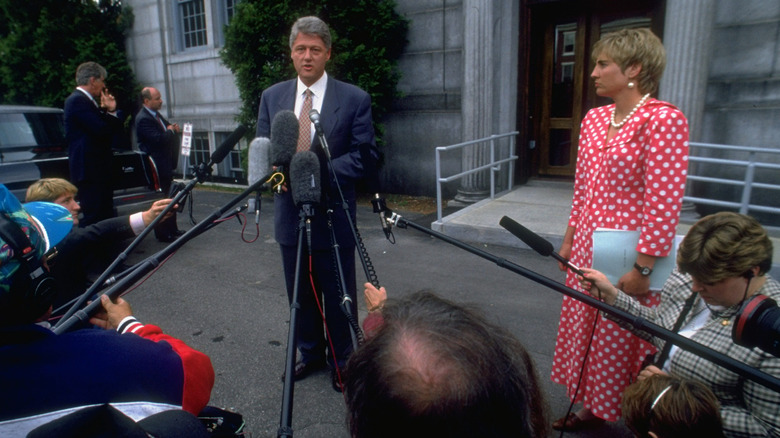 Dee Dee Myers and Bill Clinton speak with reporters in Washington, D.C. in 1993