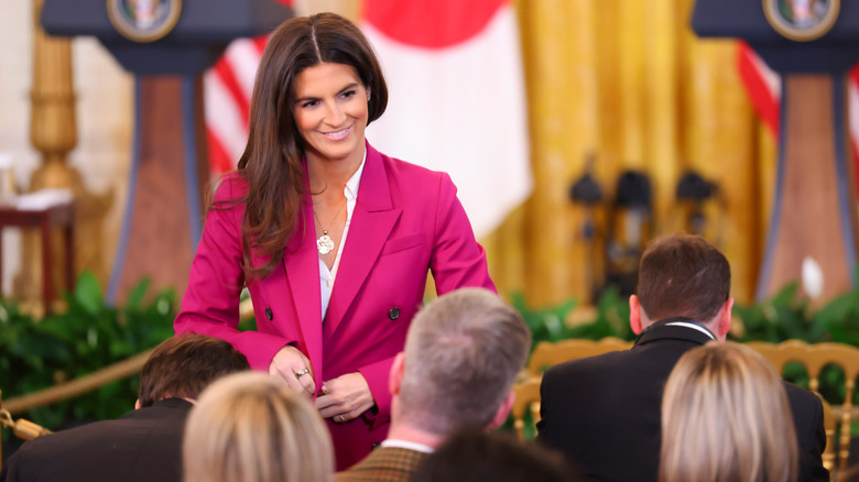 Kaitlan Collins stands in the East Room of the White House prior to a joint press conference with President Trump and Shigeru Ishiba