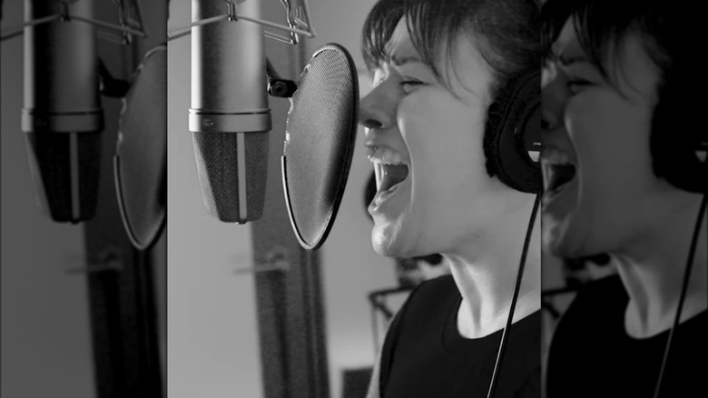 Kelly Clarkson in recording studio black-and-white
