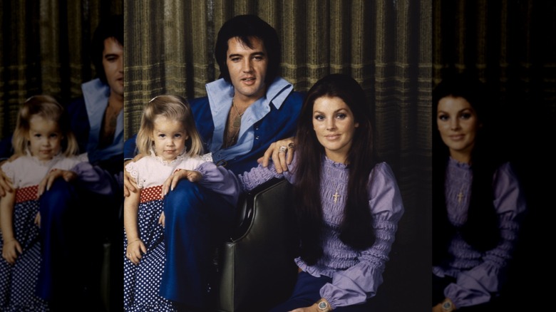 Priscilla, Lisa Marie, and Elvis presley posing for a Thanksgiving family photo in 1970.