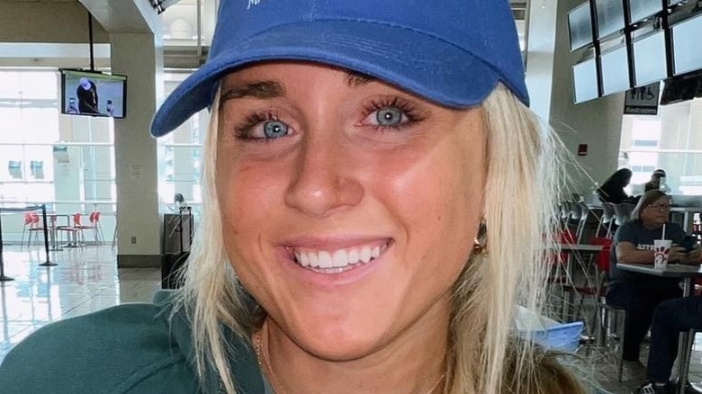 Riley Gaines poses in a hat for Instagram (2023)