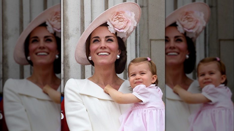 Kate Middleton holds Princess Charlotte when she was a baby
