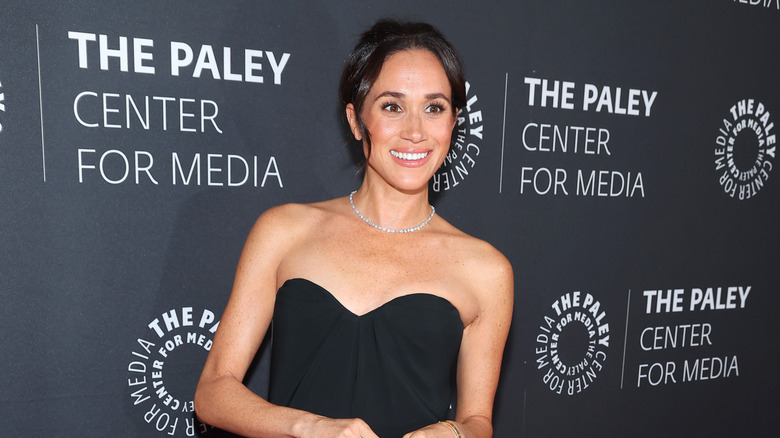 Meghan Markle at the 2024 Paley Center Honors event in a strapless black dress