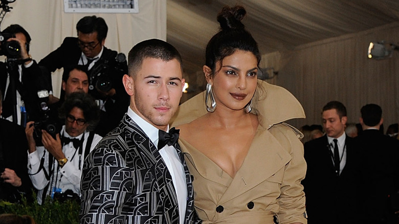 Priyanka Chopra and Nick Jonas posing on the 2017 Met Gala red carpet