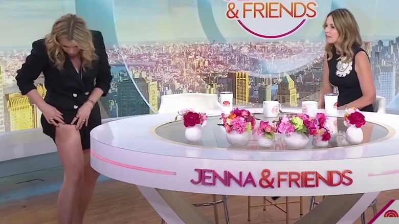 Jenna Bush Hager pulling up the leg of her shorts