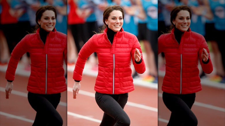 Kate Middleton runs in a red jacket and black leggings