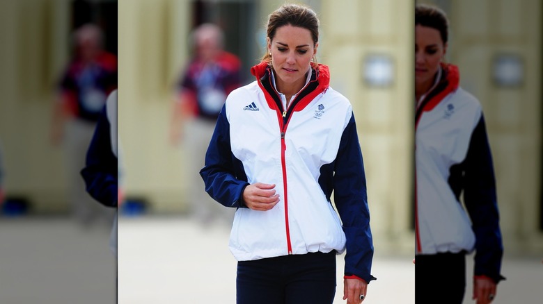 Kate Middleton wears a white, blue, and red jacket.
