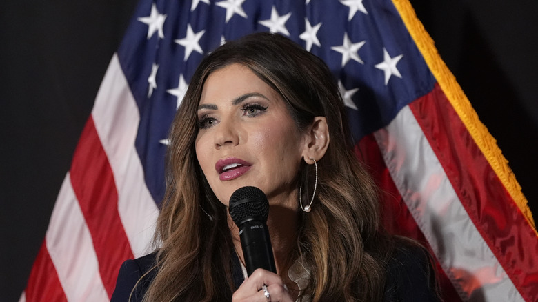 Kristi Noem speaking with microphone