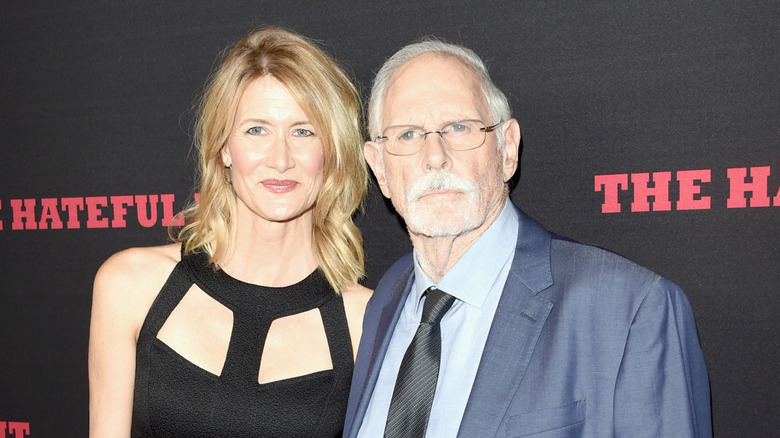 Laura Dern and Bruce Dern attend the Premiere of The Weinstein Company's "The Hateful Eight" at ArcLight Cinemas Cinerama Dome on December 7, 2015 in Hollywood, California.