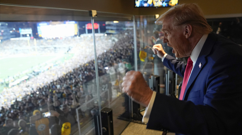 Trump cheering at football game