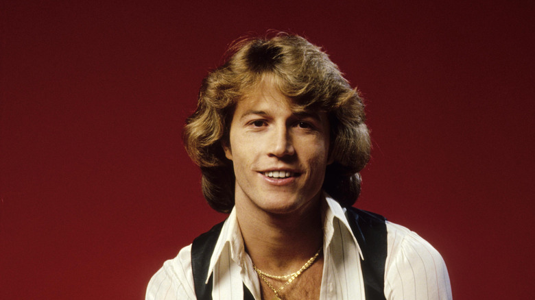 Andy Gibb posing for a studio portrait in 1978