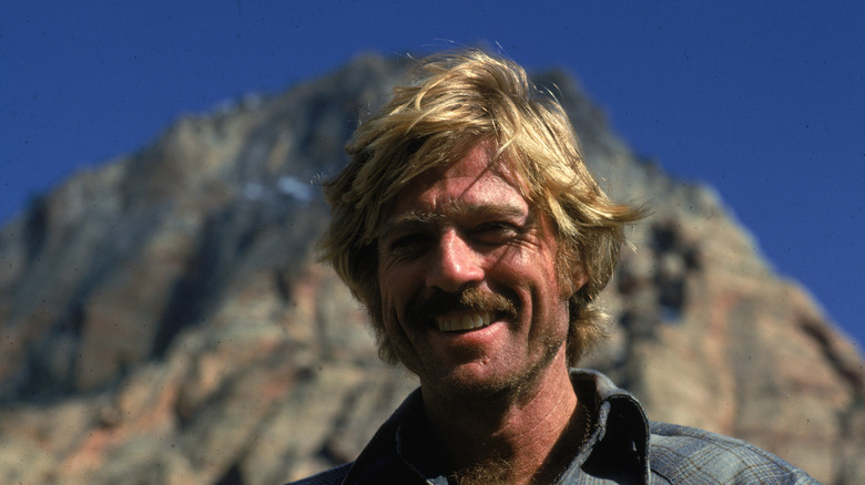 Robert Redford smiling on the set of 