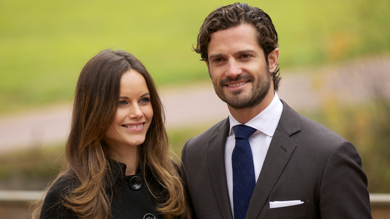 Princess Sofia in a black coat with husband Prince Carl Philip
