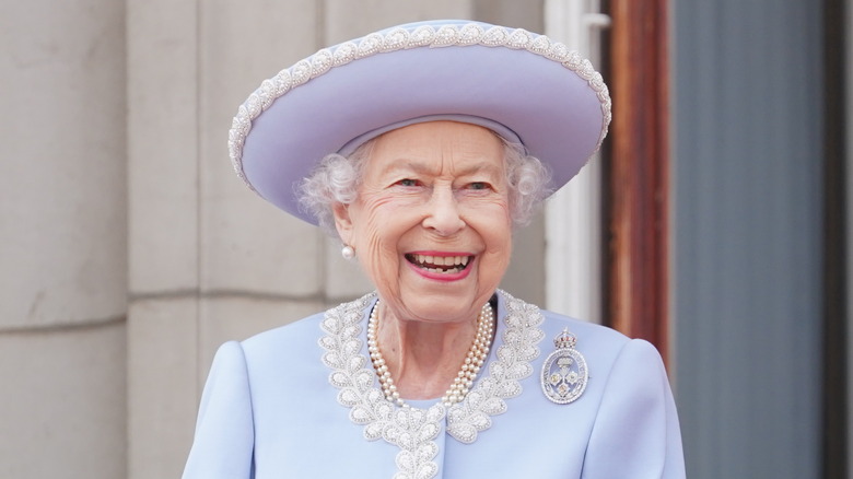 Queen Elizabeth II smiling at an event