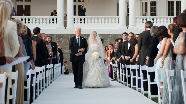 Bill Clinton walking Chelsea Clinton down the aisle
