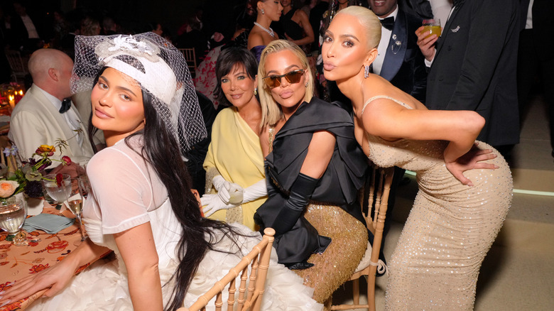 Kylie Jenner posing with Kris Jenner, Khloe Kardashian, and Kim Kardashian at the Met Gala