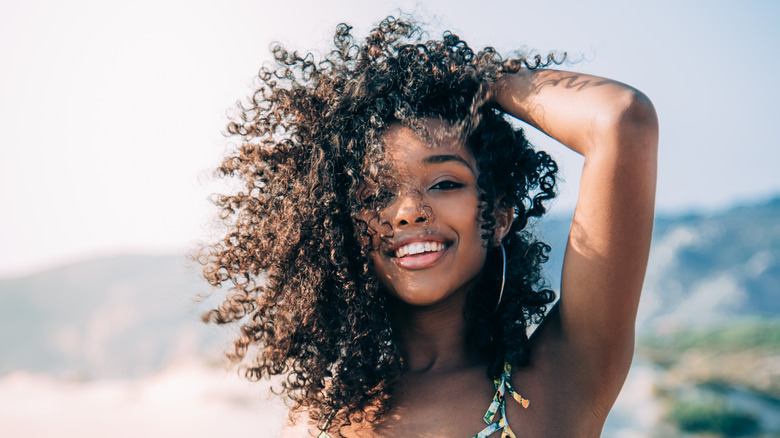 Woman with natural curly hair