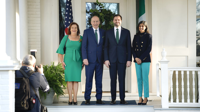 Mary Martin, Michael Martin, JD Vance, and Usha Vance posing on doorstep