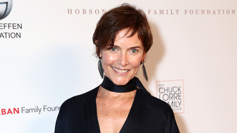 Carey Lowell smiling at charity event