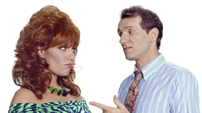 Katey Sagal and Ed O'Neill as Peg and Al Bundy in "Married... with Children"