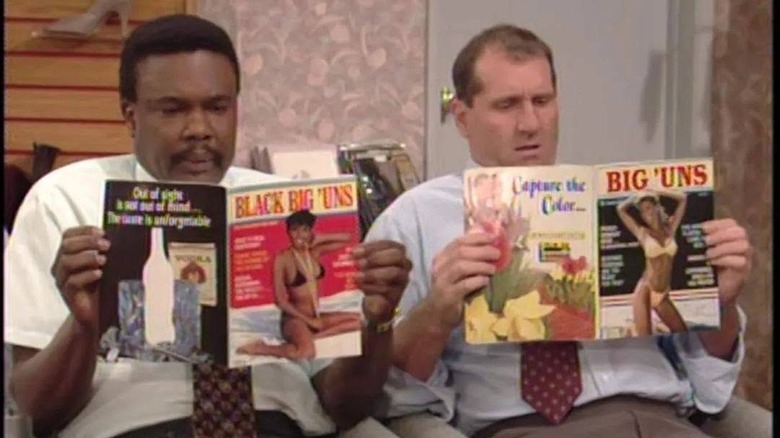 Al Bundy and his co-worker look at adult magazines in a scene from "Married... with Children"