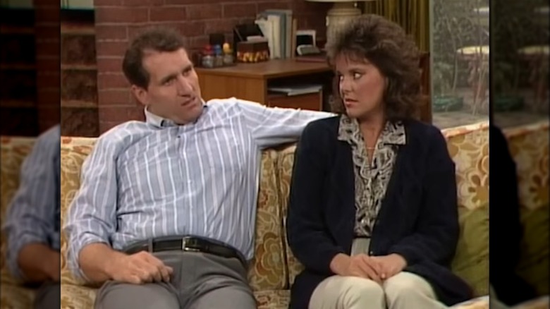 Ed O'Neill & Amanda Bearse in a scene from "Married... with Children"