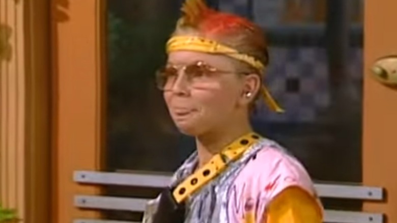 Corky Pigeon acting on TV while dressed in a very '80s-looking costume