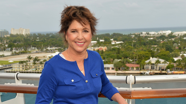 Kristy McNichol smiling outdoors