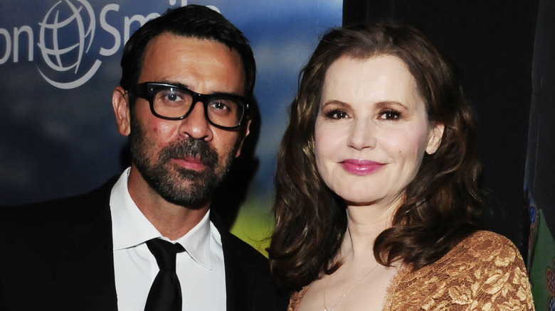 Reza Jarrahy and Geena Davis smirking