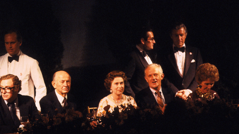 Queen Elizabeth II, State Visit to the United States of America, Michael Caine, At a party given in honour of the Queen by First Lady Nancy Reagan at 20th Century Fox Studio, Hollywood, 28th February 1983.