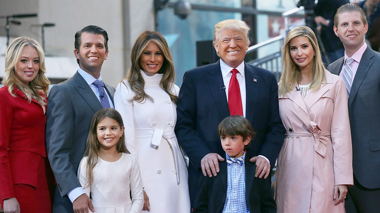 Tiffany, Donald Jr., Melania, Donald, Ivanka, and Eric Trump pose with children