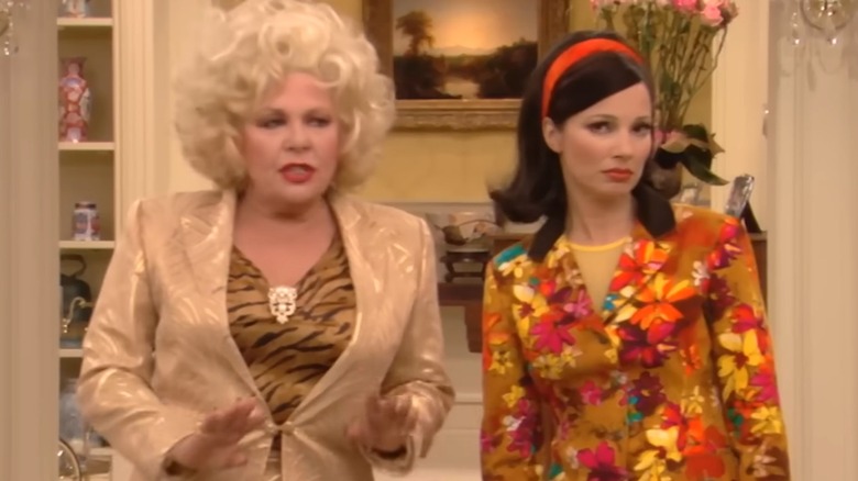 Sylvia wearing beige suit; Fran wearing groovy flowered jacket in The Nanny