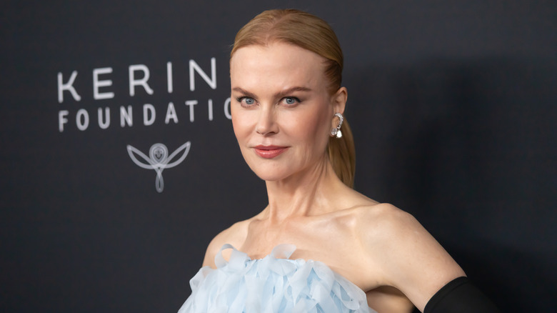 Nicole Kidman in a ruffled off-the-shoulder dress and gloves