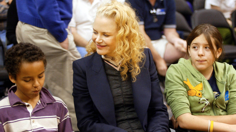 Nicole Kidman smiling and sitting with her kids Bella and Connor Cruise