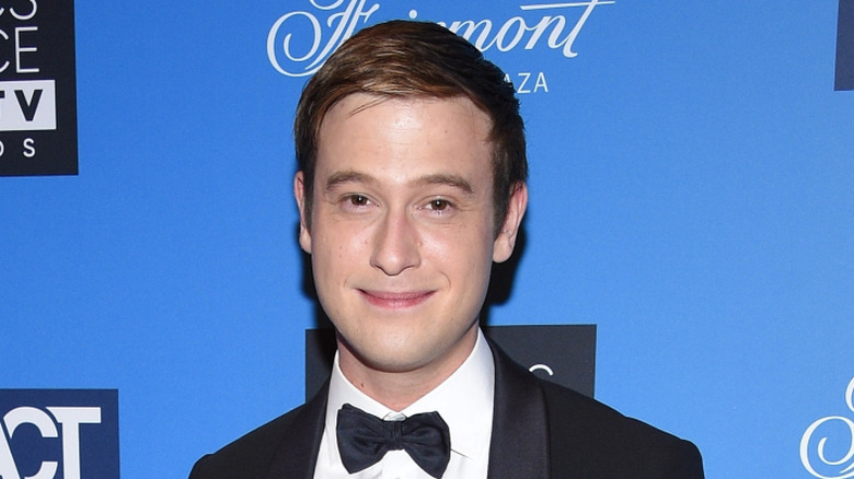 Closeup of Tyler Henry smiling at the 2022 Critics Choice Real TV Awards