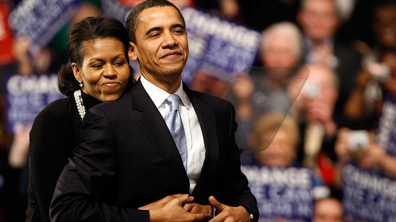 Michelle Obama hugging Barack Obama