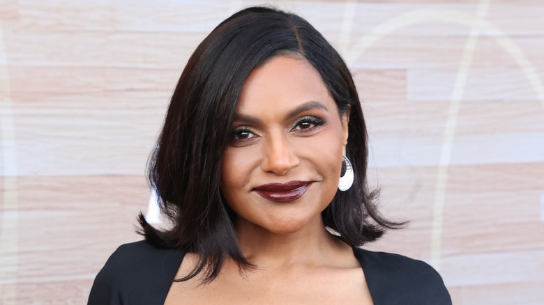 Mindy Kaling smirking