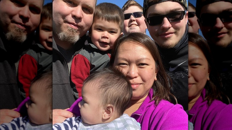 Aya and Louis with family 90 Day Fiancé