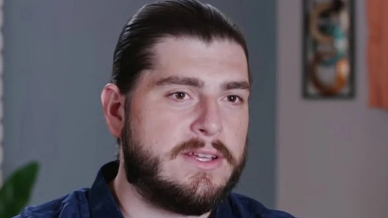 90 Day Fiancé Andrew in a confessional