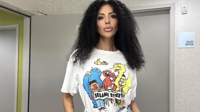 Jasmine Pineda posing inside an office space.