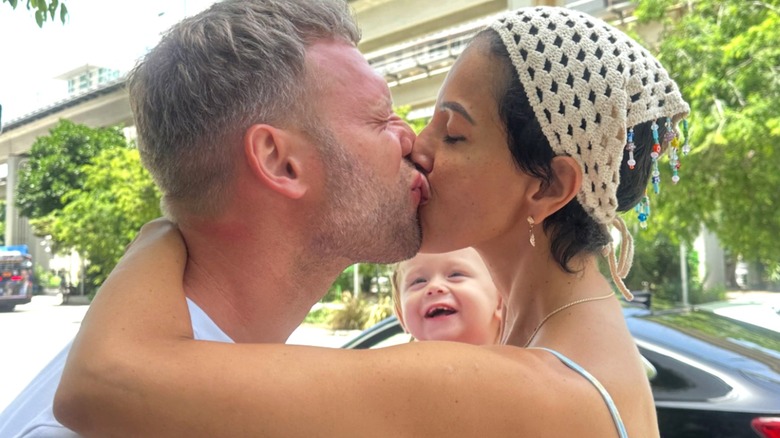 Jasmine Pineda kissing her partner, Matt Branistareanu